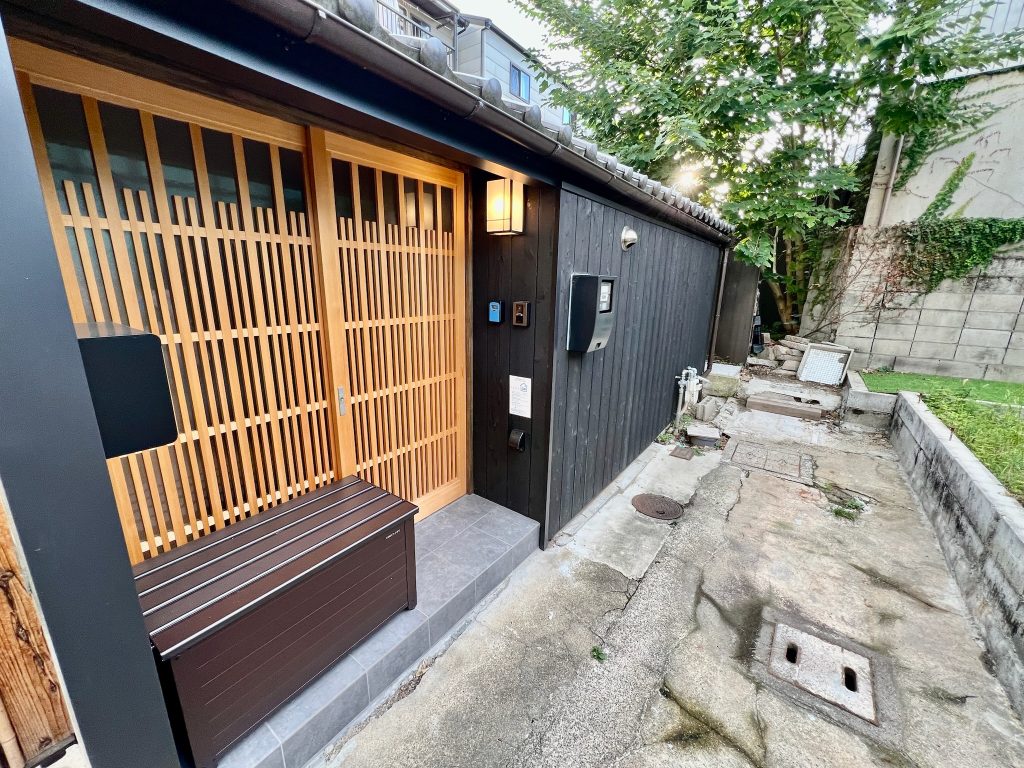 A Furusato akiya renovation in Kyoto, featuring a brand new exterior on the property made from yakiita boards